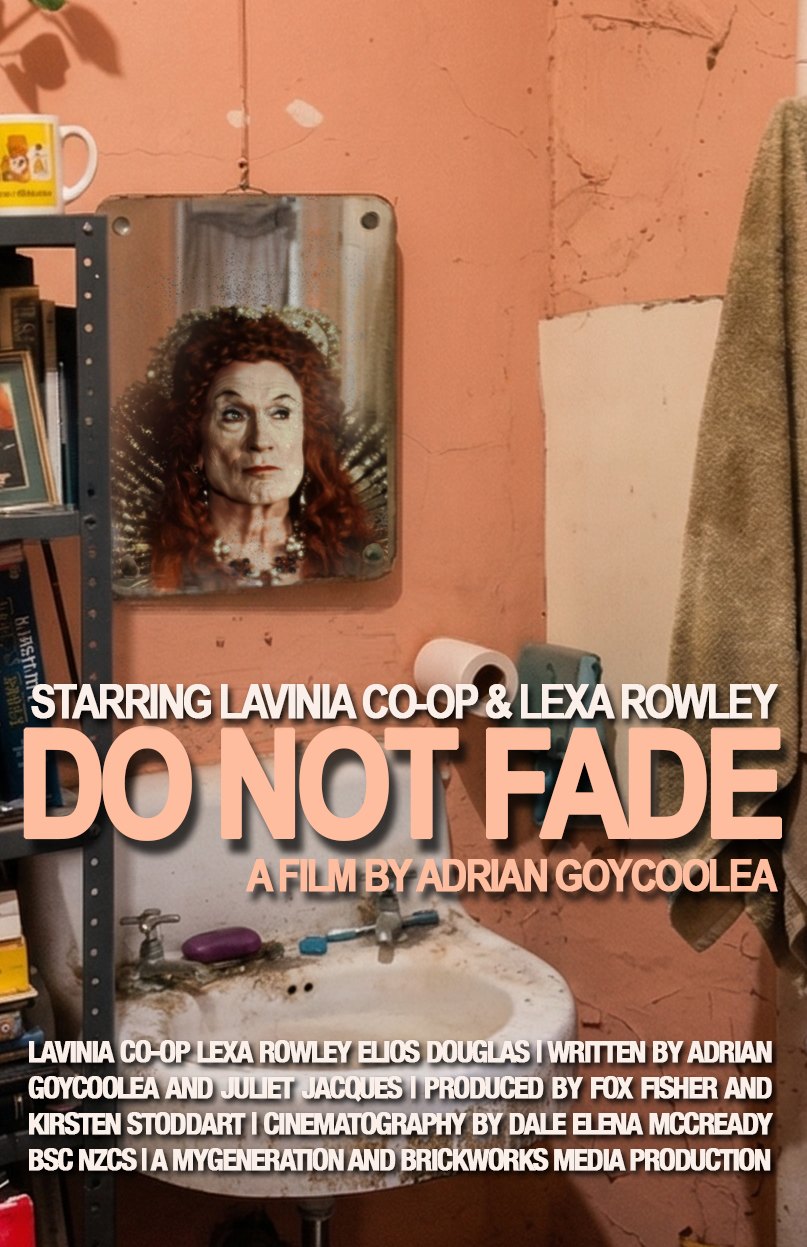 Poster. A mirror above a grimy sink shows a red-haired Elizabethan queen in place of a reflection. Title: Do Not Fade, starring Lavinia Co-op and Lexa Rowley.